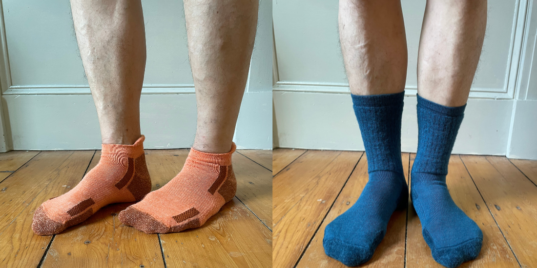 Alpaca ankle socks that are orange are on the left and blue alpaca crew socks on the right