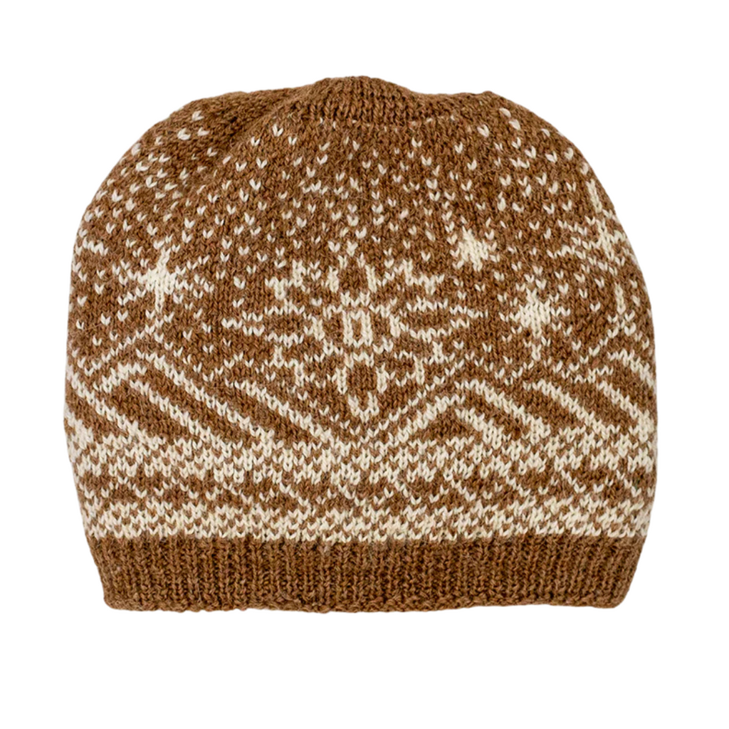 a fawn and cream beanie on a white background